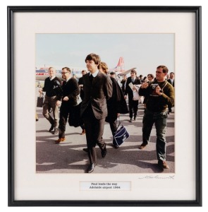 THE BEATLES IN AUSTRALIA, 1964: "Paul leads the way, Adelaide airport 1964". Original colour print, signed by Vic Grimmett in the lower margin,  24.5 x 24.5cm, 35 x 34cm overall. 