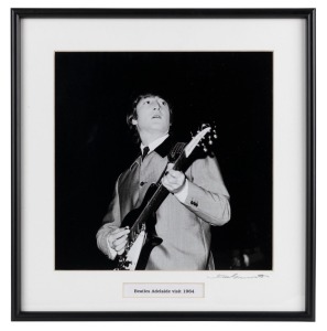 THE BEATLES IN AUSTRALIA, 1964: "Beatles Adelaide visit, 1964". Original black and white print, signed by Vic Grimmett in the lower margin, 24.5 x 24.5cm, 35 x 34cm overall.