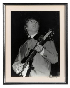 THE BEATLES IN AUSTRALIA, 1964: "John Lennon". Original black and white print, signed by Vic Grimmett in the lower margin, Number 1 of a limited printing of 20. 40 x 29.5cm, 49.5 x 39cm overall.