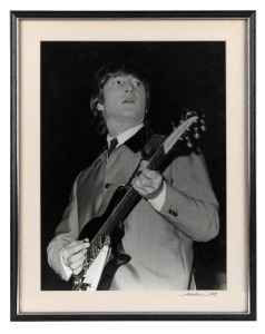 THE BEATLES IN AUSTRALIA, 1964: "John Lennon". Original black and white print, signed by Vic Grimmett in the lower margin,  Number 1 of a limited printing of 20. 40 x 29.5cm, 49.5 x 39cm overall. 