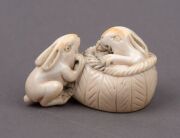 Three Japanese carved ivory netsukes comprising: turtle, rats and rabbits, Meiji Period, the largest 4.5cm wide - 4