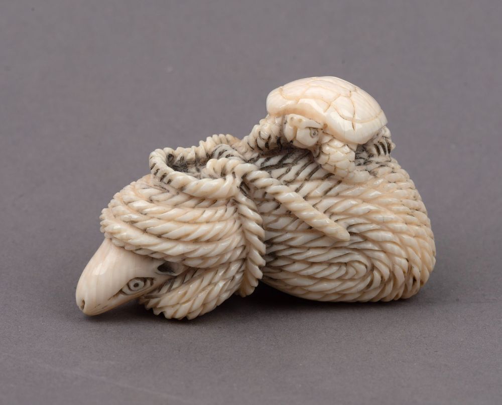 Three Japanese carved ivory netsukes comprising: turtle, rats and ...