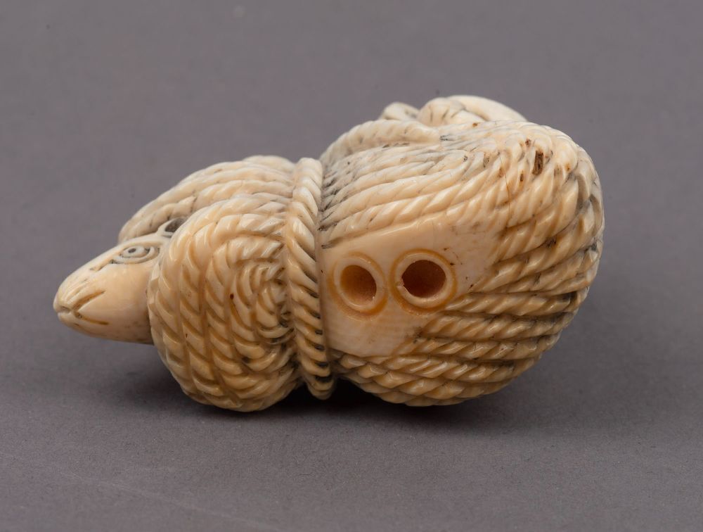 Three Japanese carved ivory netsukes comprising: turtle, rats and ...