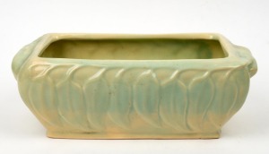 MELROSE WARE pottery flower trough with gum leaf decoration in usual soft green glaze, 12cm high, 35cm wide