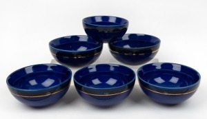 DEREK SMITH set of six blue and gilt pottery bowls in two sizes, impressed monograms and marks, the largest 7.5cm high, 16cm diameter