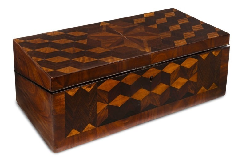 An Australian colonial marquetry writing slope made from Queensland rain forest native specimen timbers with cedar and pine secondary timbers, most likely the work of John Wilson Carey of William Street, Brisbane, circa 1860s;the long side drawer with bra