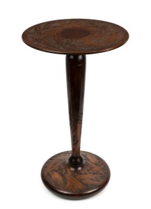 An Australian folk art stained huon pine pokerwork wine table, decorated with gumnuts, leaves and kookaburras, circa 1920s, 59cm high, 35cm diameter
