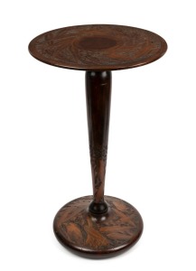 An Australian folk art stained huon pine pokerwork wine table, decorated with gumnuts, leaves and kookaburras, circa 1920s, 59cm high, 35cm diameter