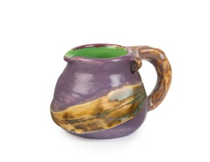 ALLAN LOWE mauve glazed pottery vase with applied gum leaf and branch handle decoration, incised "Allan Lowe", 5cm high, 8cm wide