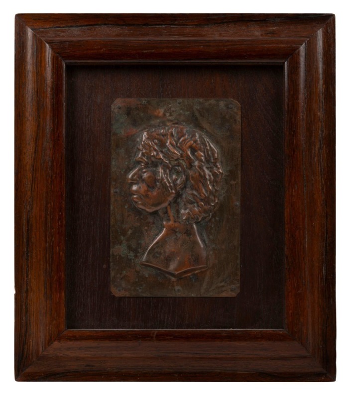 ARTIST UNKNOWN hand-beaten copper profile portrait of an Aboriginal woman mounted on cedar board in cedar frame, 19th/20th century, ​​​​​​​26.5 x 23cm overall