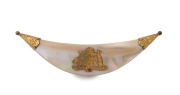 An antique engraved yellow gold mounted crescent shaped mother of pearl patriotic brooch with "Advance Australia" and coat of arms, late 19th century, 10cm wide