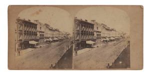 WILLIAM HETZER (active in New South Wales 1850-1867), stereoview card of GEORGE STREET south of HUNTER STREET (SYDNEY), circa 1860 stereoscopic albumen print photographic pair, each approx. 78 x 73mm and laid down on the original plain grey card, overall 82 x 173mm; verso with contemporary mss caption "George Str. south of Hunter Str.". Only one other example known; an over-exposed image in the State Library of NSW collection.