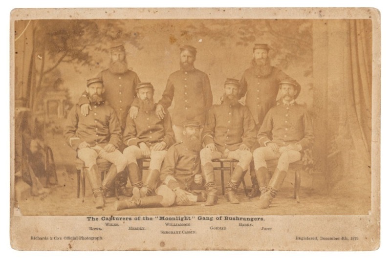 RICHARDS & CO., SYDNEY and BALLARAT, PHOTOGRAPHERS: "The Capturers of the "Moonlight" Gang of Bushrangers" cabinet card size albumen paper print laid down on printed card, with the title, names of the policemen, and Richards & Co's details below the image