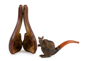 An antique Meerschaum and amber pipe with rare kangaroo and joey carved bowl, housed in original plush case, 19th century, 15cm long