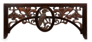 An antique Australian Art Nouveau stained pine architectural hallway arch with a central gilded kookaburra in deep relief, circa 1910s-1920s, 50 x 116cm