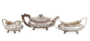 CAPTAIN JOHN PIPER (1774–1851) INTEREST: Antique three piece sterling silver tea service of squat gadrooned form on hairy paw feet, engraved with flying griffin crest, by Joseph Teconet of London, circa 1807. Accompanied with an envelope of assorted family documentation and information pertaining to Piper and his descendants. Captain Piper of the New South Wales Corps for whom Point Piper in Sydney is named,