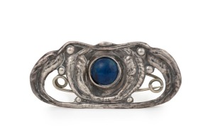 An Australian silver brooch with gum leaf decoration and cabochon lapis lazuli, 20th century, 5cm wide