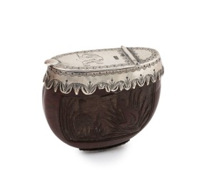 An antique burra nut vesta case carved with a vignette of an Aboriginal hunting an emu, mounted in silver, 19th century, stamped "STG", 4cm high