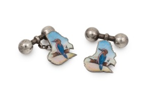 A pair of antique sterling silver cufflinks with enamel kookaburra decoration, made in Birmingham, early to mid 20th century,