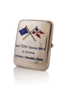 Antique sterling silver English cigar case with enamel decoration of crossed flags with inscription "YACHT 'UIRA' SEASON 1901-2, 16 STARTS. 10 FIRSTS, 2 SECONDS, 1 THIRD.", made by William Neale of Chester, circa 1902, 9cm high, 118 grams. The “Uira” was built for Gideon Palmer of Melbourne by Bailey Bros., Auckland, New Zealand, and launched in 1896.