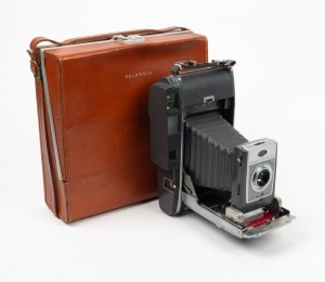 POLAROID: Electric Eye 900 Land Camera, c. 1960, in leather case with five accessories and printed materials.