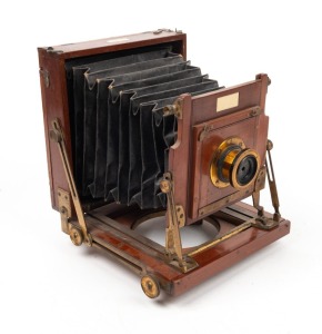 UNDERWOOD: 'Exhibition' 4¾ x 6½" plate triple-extension field camera, c. 1887, with uninscribed brass lens and 'Frost & Shipham My Opticians Sydney' retailer's inlay.