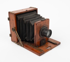 3⅛ x 4⅛" plate field camera with uninscribed lens.