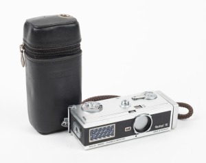 ROLLEI: Rollei 16 miniature viewfinder camera, c. 1963, with Tessar 25mm f2.8 lens [#3892045], together with wrist strap and leather zip-case.