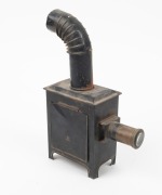 GEBR&Uuml;DER BING N&Uuml;RNBERG: 29cm tall children's magic lantern, c. 1910s, with 'B(ing) W(erke) Germany' stamp on door.