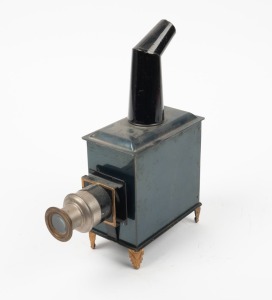 GEBRÜDER BING NÜRNBERG: 27cm tall children's magic lantern, c. 1910s, with 'GBN' emblem on door.