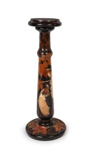 MARGUERITE MORAN Tasmanian huon pine turned pedestal with poker work and hand-painted birds of paradise decoration, circa 1930s, 92cm high