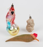 Rare celluloid May Gibb gumnut baby ornament and two vintage blown glass Christmas ornaments, 20th century, (3 items), the largest 14cm long