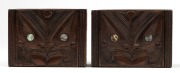 Two carved New Zealand boxes decorated with carved Tiki with paua shell eyes and with pictorial labels "Tapu: P. H. Leonard, 26 Sumner St, Rotorua, New Zealand. Guaranteed Genuine Maori Hand Carved",&nbsp; 4.5cm high, 13.5cm wide, 10cm deep - 2