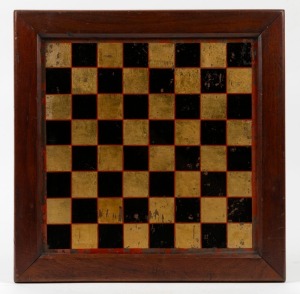 An antique Australian chess board with verre eglomise checker board top and cedar mount, 19th century, 40 x 40cm