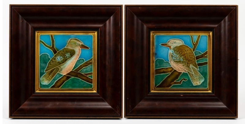 A pair of antique majolica kookaburra tile plaques in later timber frames, early 20th century, 15 x 15cm, 30 X 30cm overall