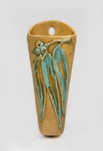ROBERT McCREDIE pottery wall pocket with applied gumnuts and leaves, incised with artist's monogram and "Epping, N.S.W.", 25.5cm high