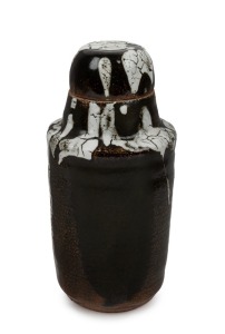 MARGARET McNAUGHT brown pottery lidded tea canister, splashed shino over tenmoku glaze, circa 1950s, incised "Maggie McNaught" and dated, 21cm high