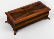 An Australian timber glove box made from Queensland walnut, maple and kauri pine, circa 1930, ​​​​​​​10cm high, 30cm wide, 14cm deep