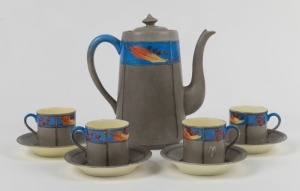 ADA NEWMAN porcelain coffee pot and four cups and saucers, hand-painted with gumnuts and gum leaves, (9 items), signed "Ada I. Newman" to bases of the cups, the coffee pot 18cm high
