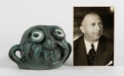 SIR HENRY BOLTE pottery face mug by GUS & BETTY McLAREN of Warrandyte, Victoria, circa 1970s. Modeled after a work by the noted political cartoonist LES TANNER. Incised "Designed By Tanner", 11cm high, 17cm wide Accompanied by a signed portrait photograph - 3