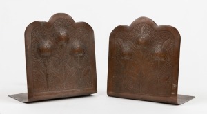 Antique Australian Arts & Crafts copper bookends with engraved waratah decoration, circa 1900, 17cm high