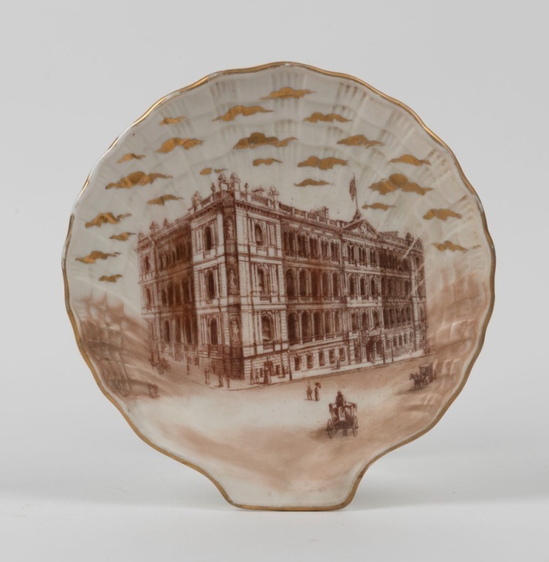 COLONIAL SECRETARY'S OFFICE, antique shell shaped bisque porcelain cabinet plate with gilt highlights depicting the Sydney landmark on the corner of Bridge and Macquarie Streets, 19th century, 21cm long