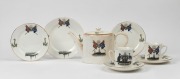 "H.M.A.S. SYDNEY DESTROYED THE EMDEN AT KEELING COCOS ISLAND, NOV. 9, 1914" antique English commemorative porcelain teapot, together with a pair of matching teacups, saucers and plates. Reverse adorned with coat of arms and emblazoned "Advance Australia,