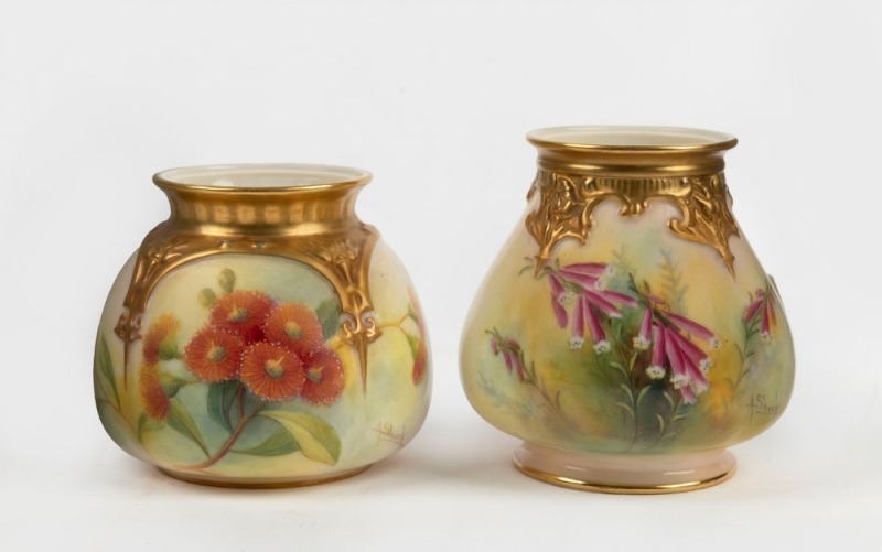 Two ROYAL WORCESTER antique English porcelain vases (missing lids), hand-painted with gum blossoms and Australian wild flowers, signed "A. Shuck", puce factory marks to base, one stamped "Made Expressly For Percy Marks, Sydney", 8cm and 9cm high