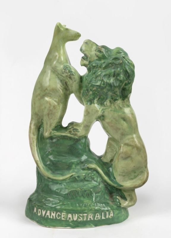 "ADVANCE AUSTRALIA, 1901" antique green glazed pottery lion and kangaroo statue, signed on the reverse (illegible), ​​​​​​​26.5cm high