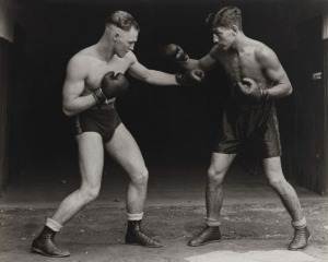 [OLD-TIME BOXING] An album containing a collection of original and reproduction large-format photographs, mainly approx. 20 x 25cm; the originals often with annotations verso as to date and boxer's name indicate that they are for bouts conducted in Austra