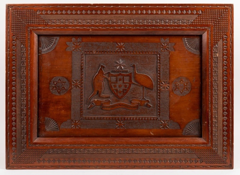 "ADVANCE AUSTRALIA" antique kauri pine panel with chip carved coat of arms and matching frame, 19th/20th century, ​​​​​​​56 x 67cm overall