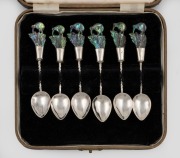 A set of six vintage New Zealand silver teaspoons with carved paua shell kiwi bird finials, in plush fitted box, circa 1930s, the box 16cm wide