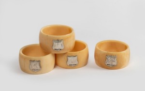 WILLIAM DRUMMOND & Co. of Melbourne set of four antique ivory napkin rings with applied Australian silver shields, early 20th century, 5cm diameter, 2.5cm wide