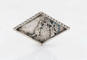 An antique sterling silver diamond shaped brooch with kangaroo decoration in landscape, 19th century, ​​​​​​​5cm wide